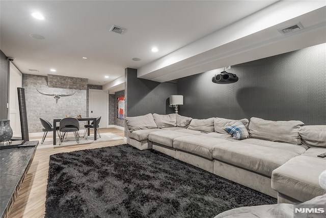 living room with light hardwood / wood-style flooring