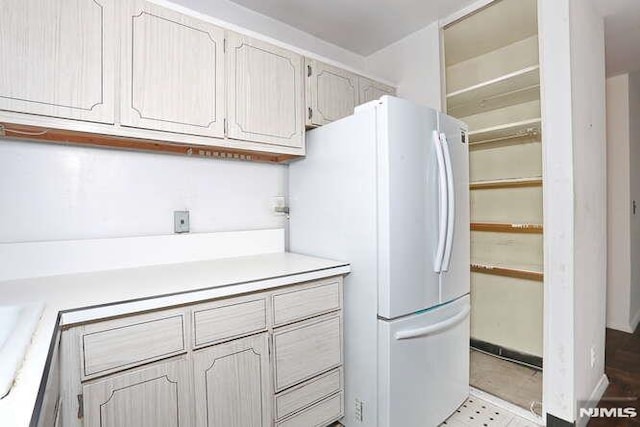 kitchen with white fridge and sink