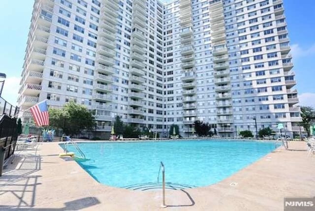 view of pool with a patio