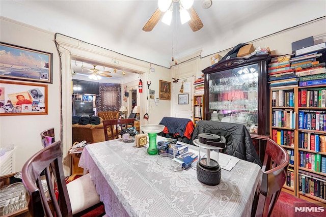 dining room featuring ceiling fan