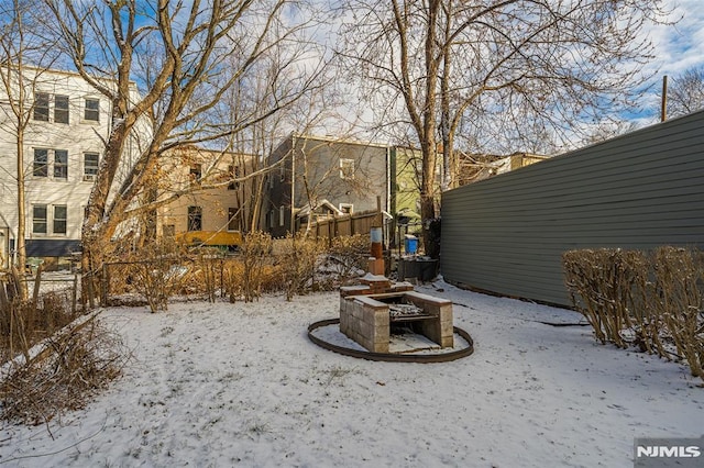 view of yard covered in snow