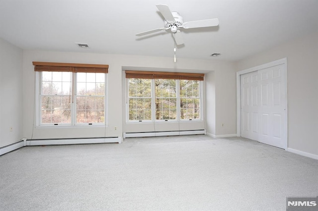 interior space with ceiling fan