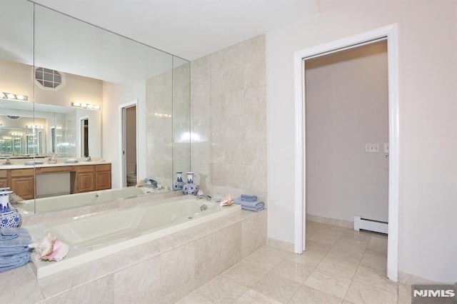 bathroom featuring toilet, tiled bath, baseboard heating, tile patterned floors, and vanity