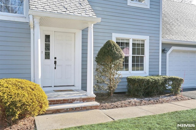 entrance to property with a garage