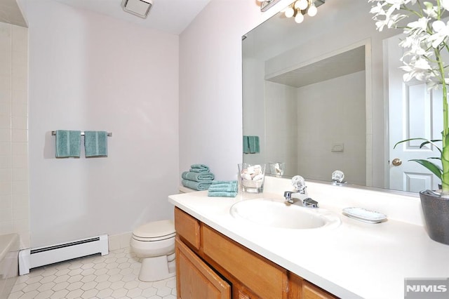 bathroom with a baseboard heating unit, toilet, tile patterned floors, and vanity