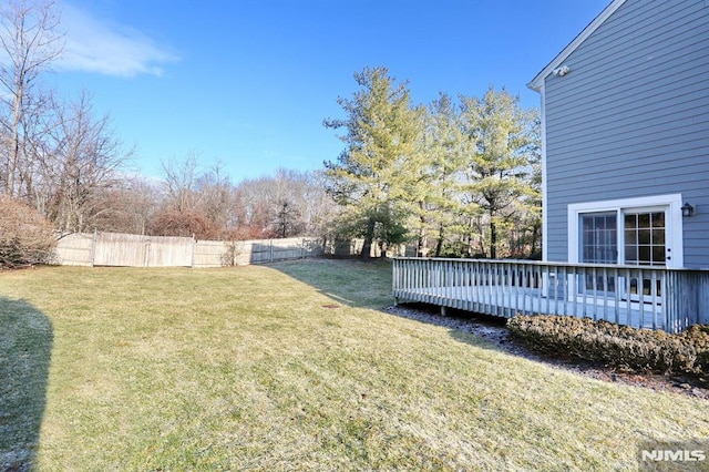 view of yard featuring a deck