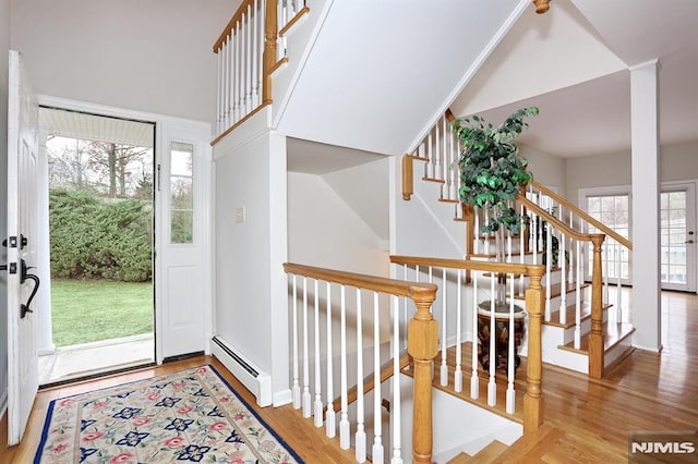 foyer with a baseboard radiator