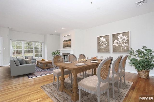 dining area featuring hardwood / wood-style flooring