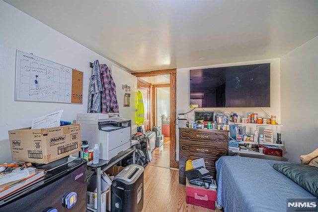 bedroom with light hardwood / wood-style flooring