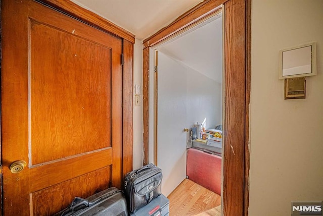 hall with light hardwood / wood-style floors