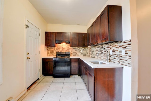 kitchen featuring decorative backsplash, sink, black range with gas cooktop, and light tile patterned flooring