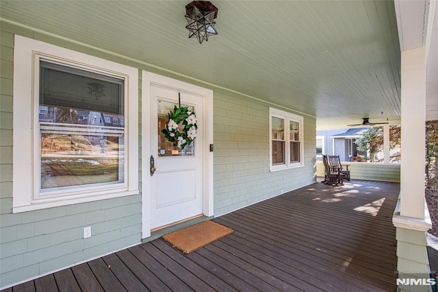 wooden deck featuring covered porch