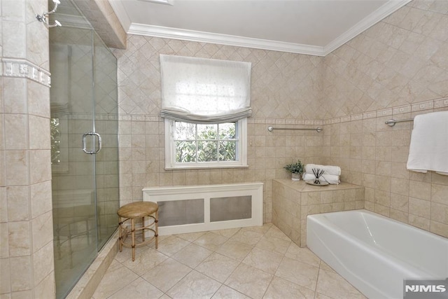 bathroom featuring shower with separate bathtub, tile patterned flooring, tile walls, and ornamental molding