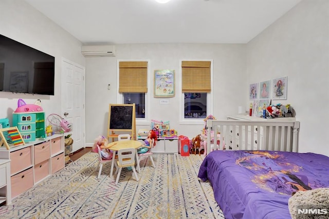 bedroom with a wall mounted air conditioner