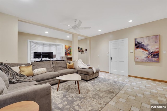 living room featuring ceiling fan