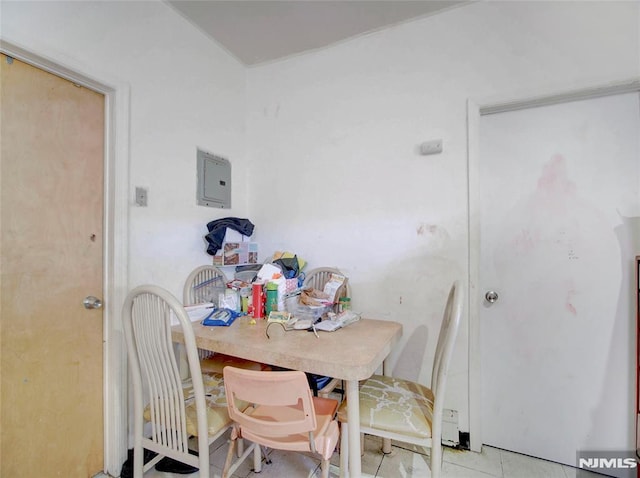 dining area featuring light tile patterned floors