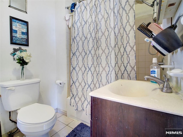 full bathroom featuring sink, tile patterned flooring, shower / bath combo, and toilet