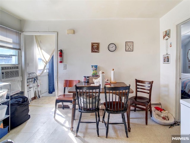 dining room with cooling unit