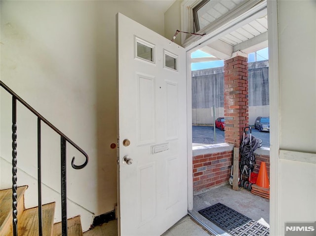 foyer featuring a healthy amount of sunlight