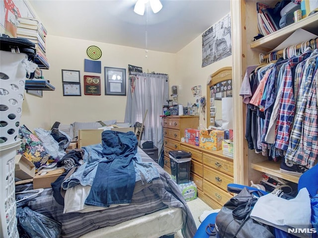 bedroom featuring ceiling fan