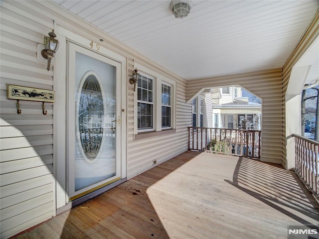 deck featuring covered porch