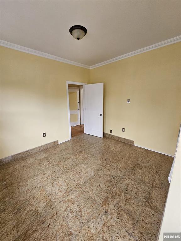 empty room with ornamental molding