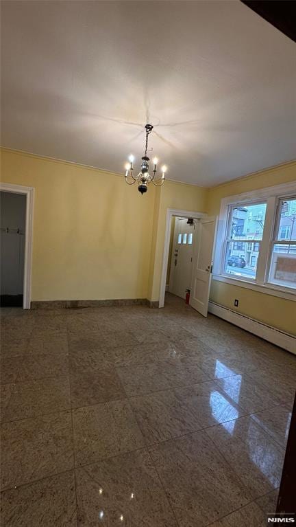 interior space featuring a baseboard heating unit and a notable chandelier