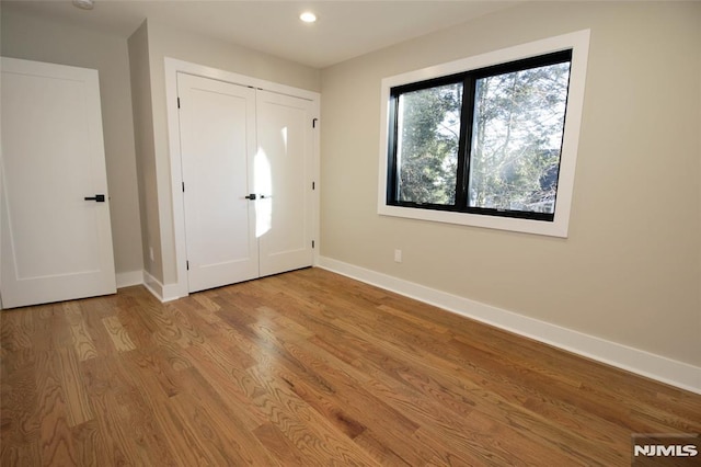 foyer entrance with light wood-type flooring