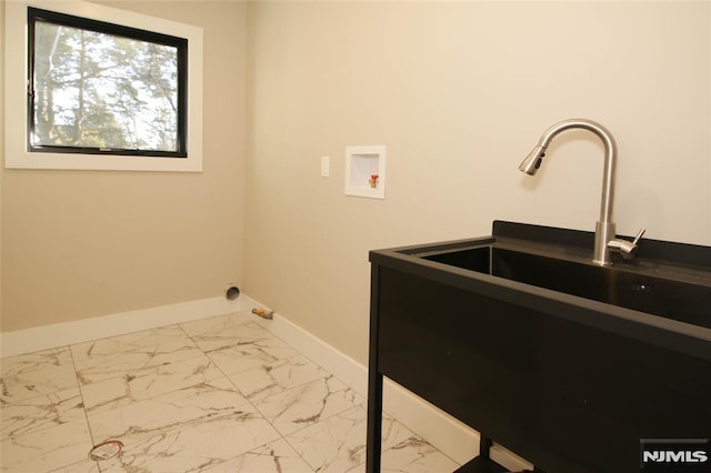 washroom featuring sink and hookup for a washing machine