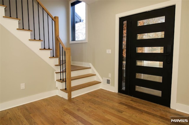 foyer featuring hardwood / wood-style floors