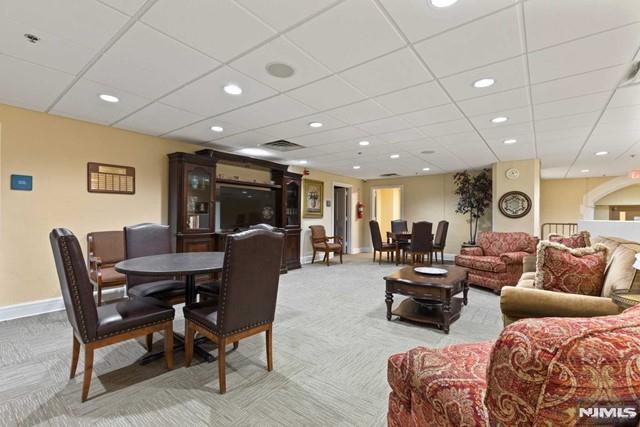 dining area featuring carpet