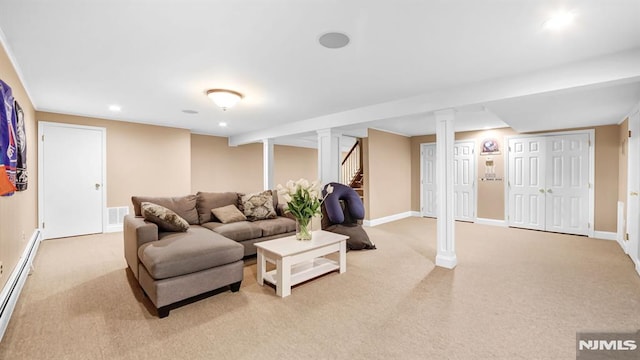 living room featuring a baseboard radiator and light colored carpet