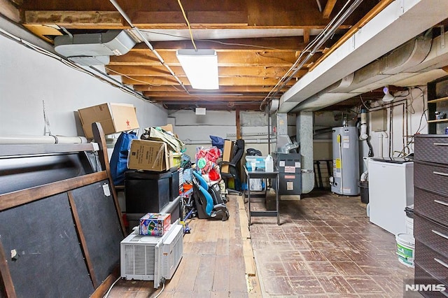 basement featuring gas water heater and hardwood / wood-style flooring