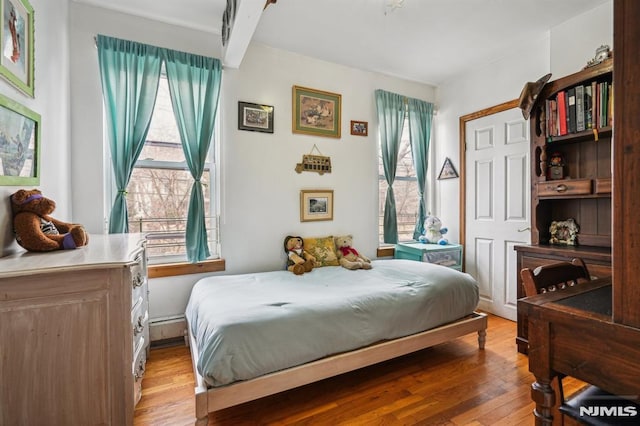 bedroom featuring hardwood / wood-style floors