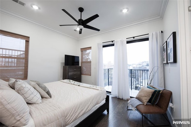 bedroom with ceiling fan, access to exterior, dark hardwood / wood-style flooring, and crown molding