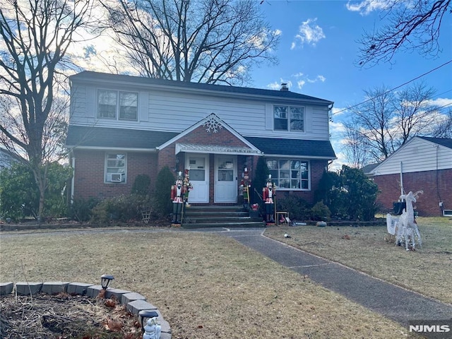 view of front property featuring a front yard