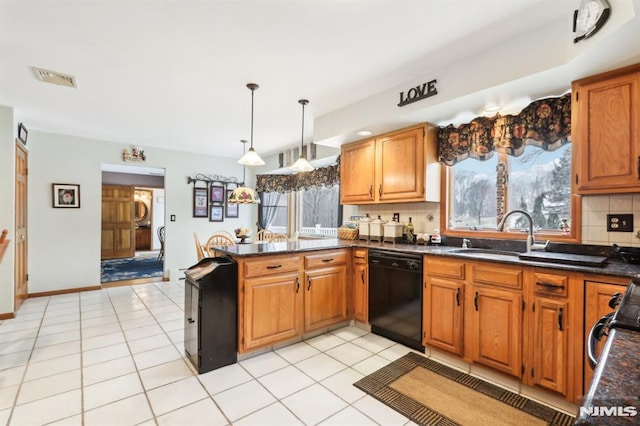 kitchen featuring kitchen peninsula, dishwasher, hanging light fixtures, light tile patterned floors, and decorative backsplash