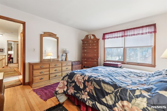 bedroom featuring wood-type flooring