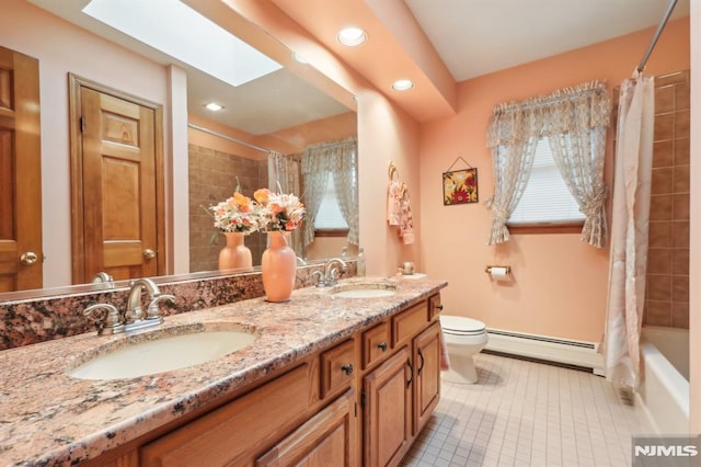 full bathroom featuring shower / bathtub combination with curtain, toilet, a skylight, vanity, and a baseboard heating unit