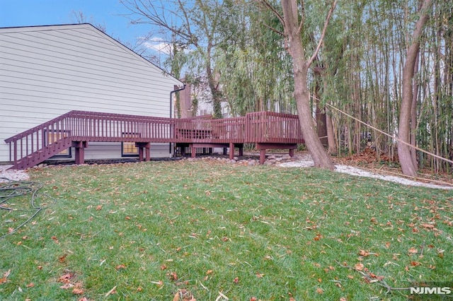 view of yard with a deck