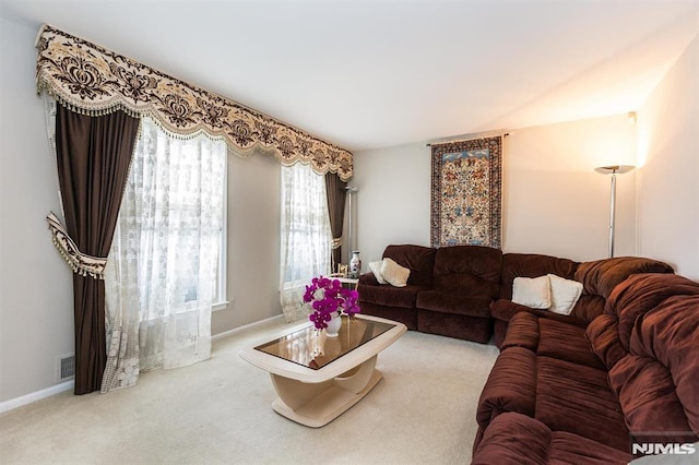 living room with light colored carpet