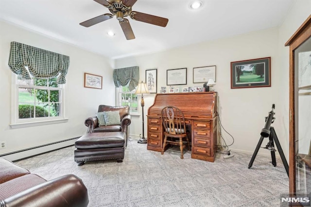 carpeted home office with ceiling fan and a baseboard radiator