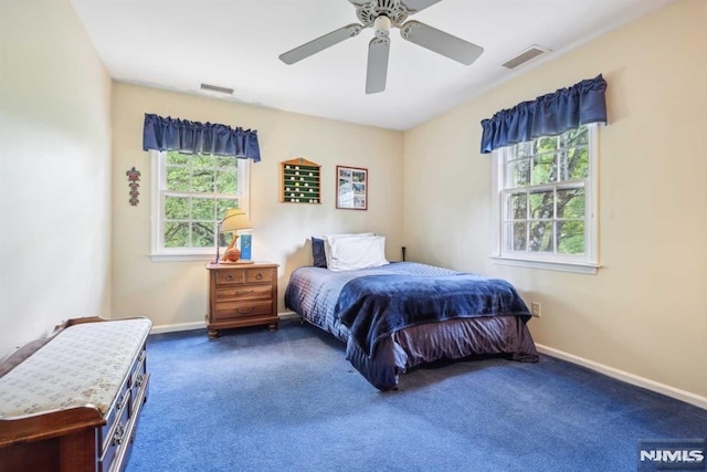 carpeted bedroom with ceiling fan