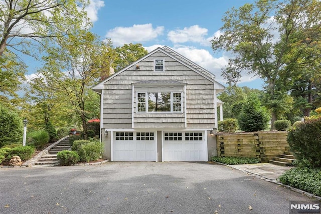 view of home's exterior featuring a garage