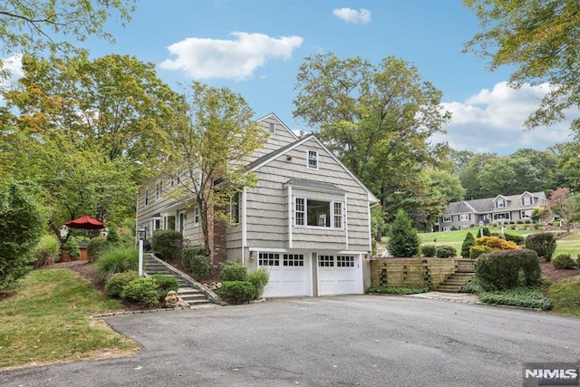 view of home's exterior with a garage