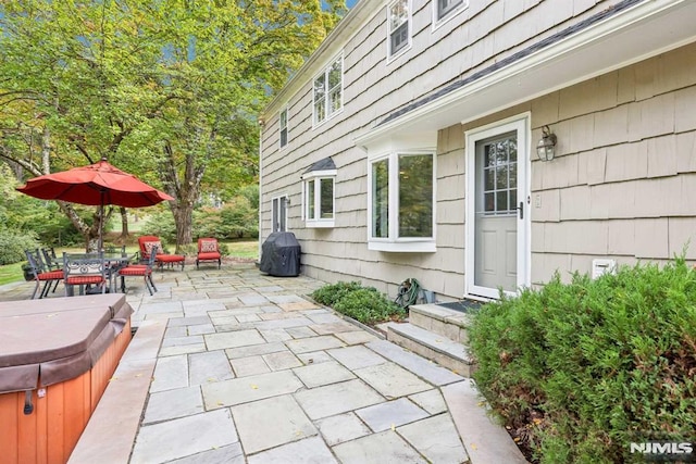 view of patio featuring a hot tub