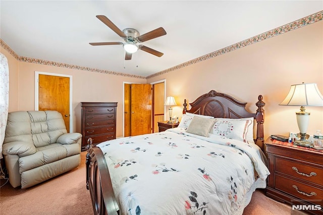 bedroom featuring ceiling fan and carpet floors