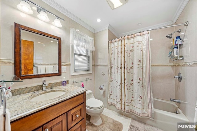 full bathroom featuring toilet, vanity, tile walls, tile patterned flooring, and shower / bathtub combination with curtain