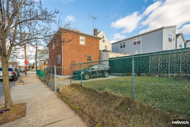 view of home's exterior featuring a lawn