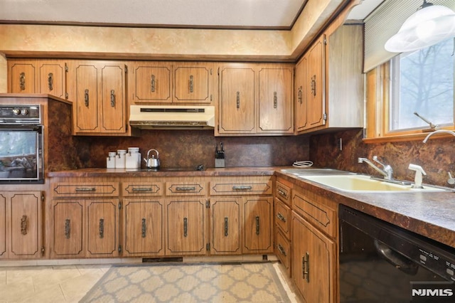 kitchen with sink, light tile patterned floors, tasteful backsplash, and black appliances